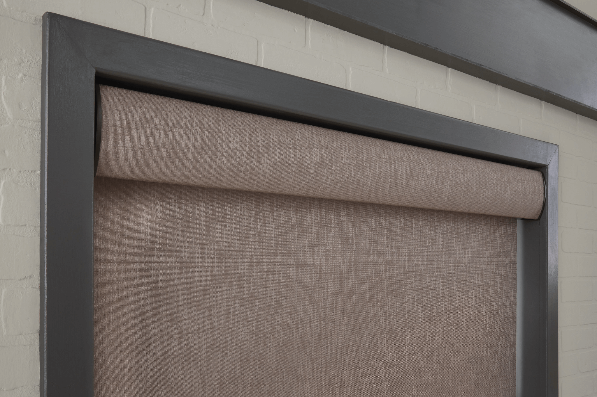 Brown textured roller shade with textured valance